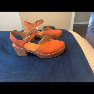 Heeled clog like new.